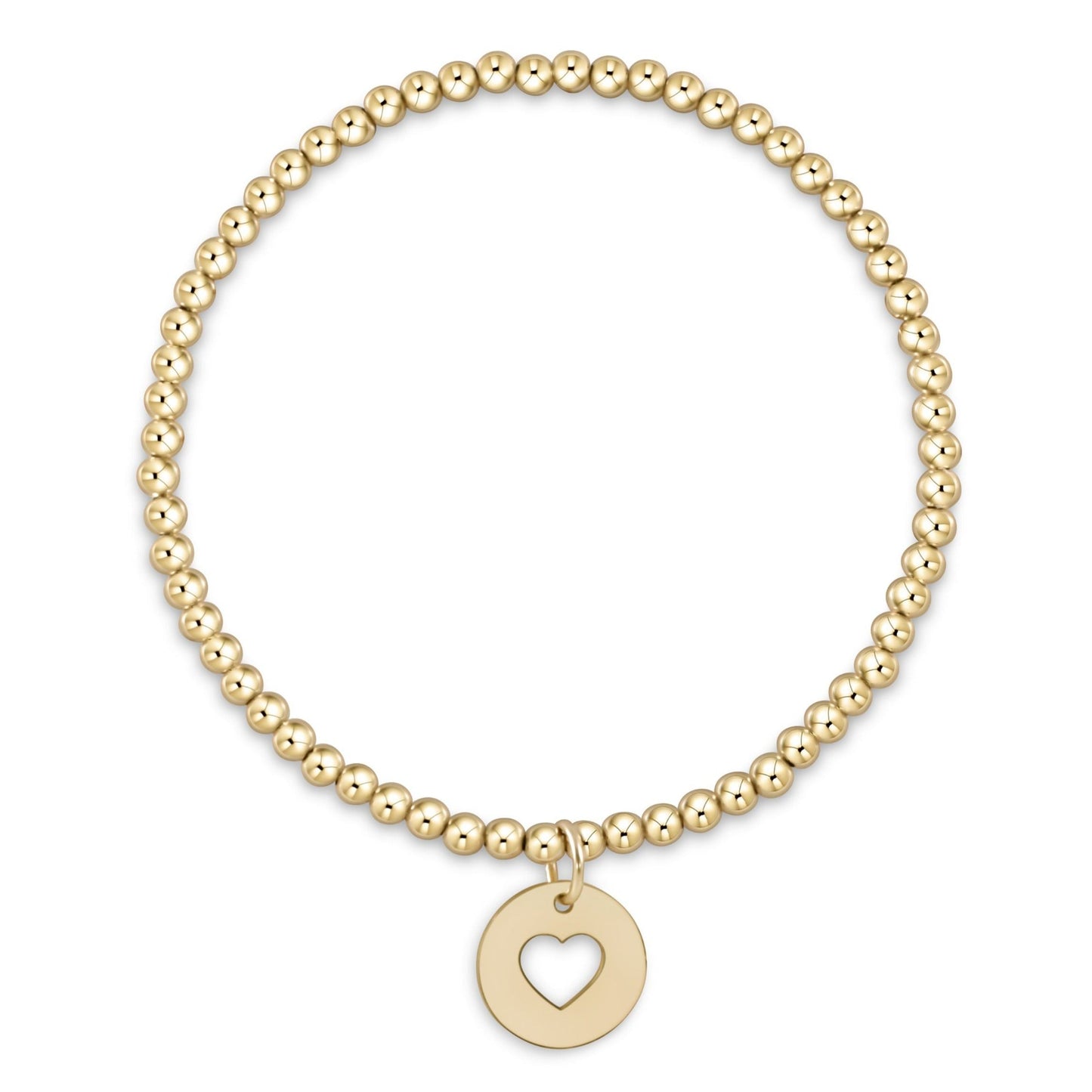 Gold beaded stretch bracelet with circular cutout heart charm pendant