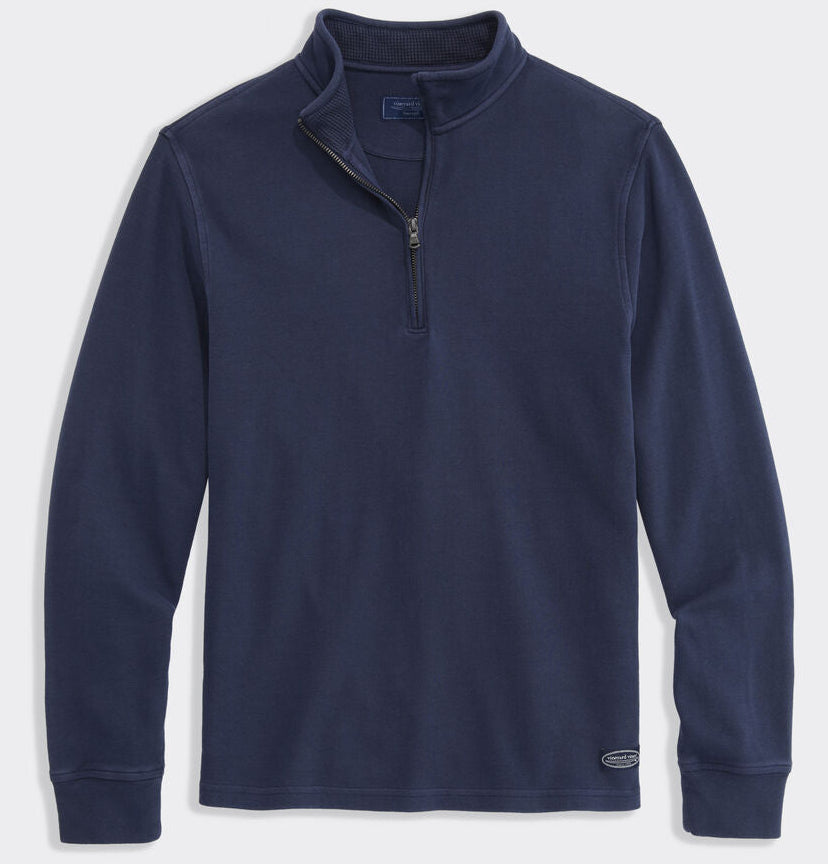 Navy blue quarter-zip pullover with waffle collar and metal zipper