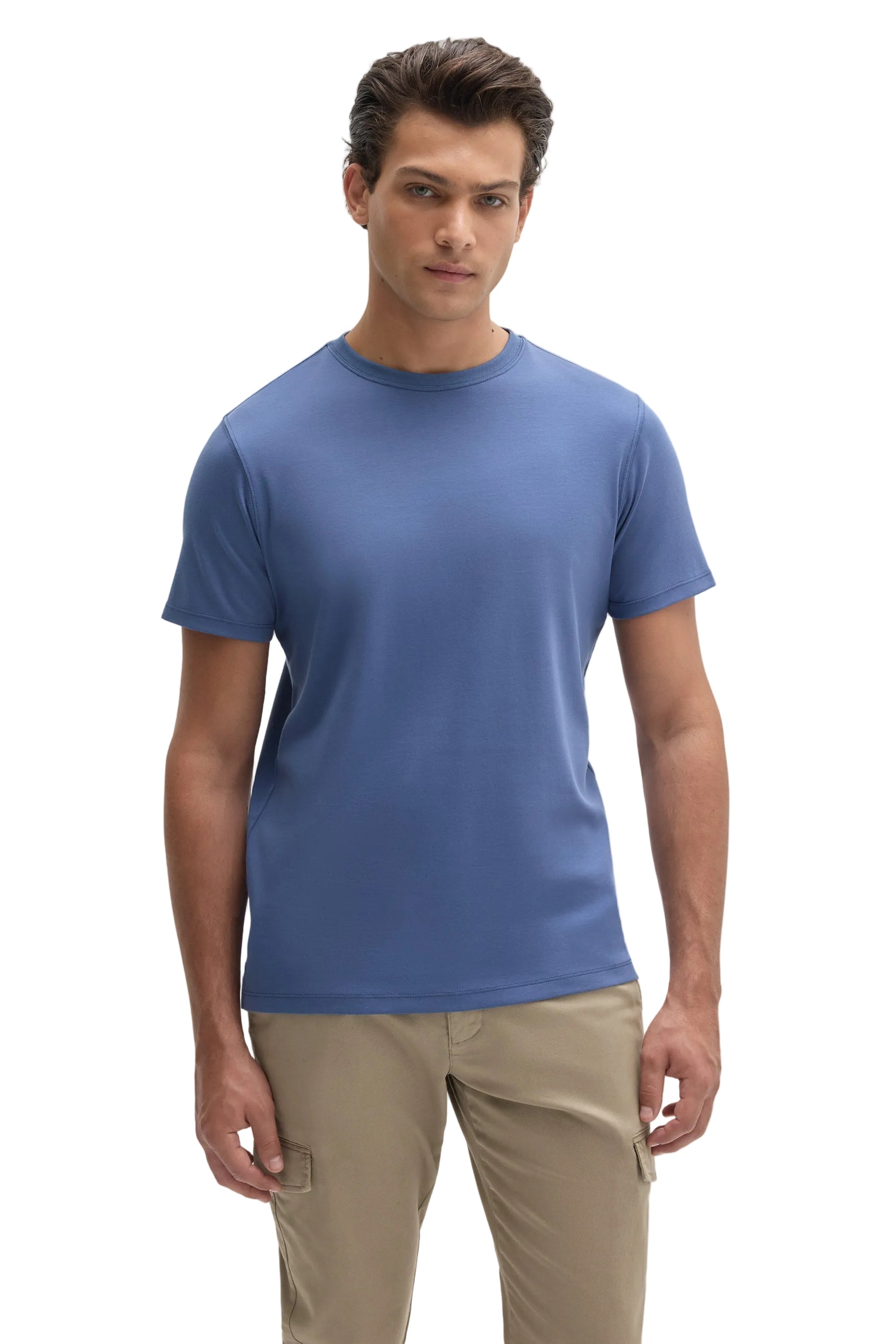 Man wearing a plain steel blue short-sleeve crew neck cotton t-shirt with khaki cargo pants