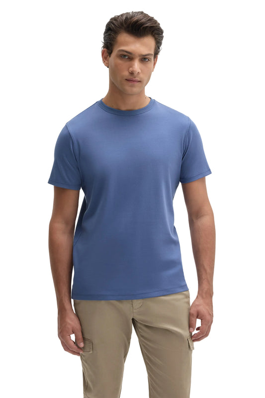 Man wearing a plain steel blue short-sleeve crew neck cotton t-shirt with khaki cargo pants