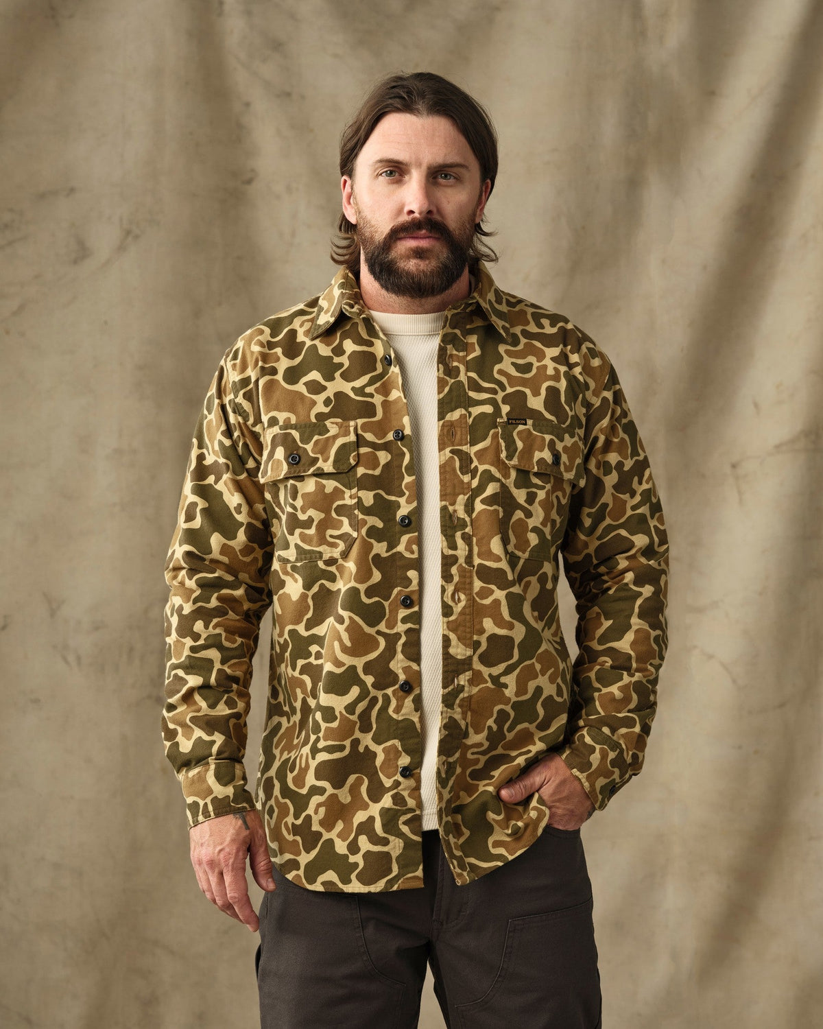 Filson Field Flannel Shirt in buckskin camo pattern with chest pockets, worn open