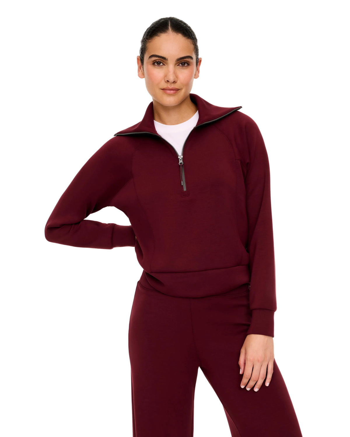 Women's burgundy half-zip pullover sweatshirt with high collar and matching pants