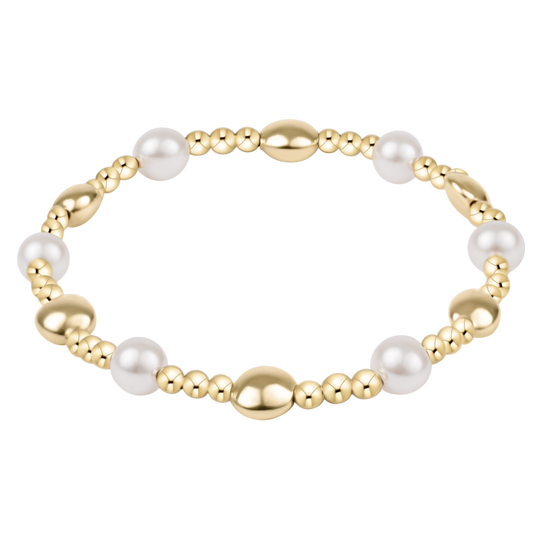 Gold-filled beaded bracelet with white freshwater pearls and oval gold accent beads
