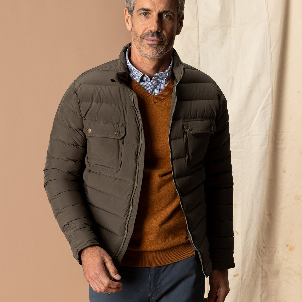 Men's olive brown quilted down puffer jacket with chest pockets and zip front
