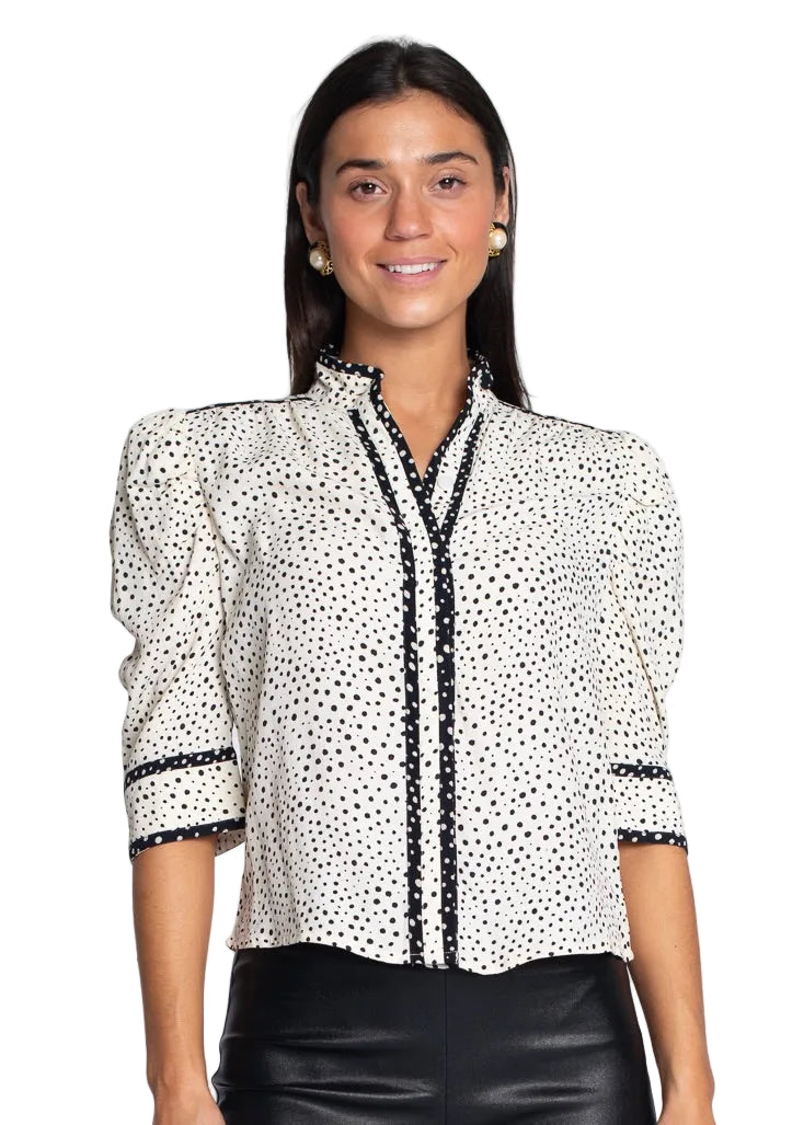 Women's cream and black polka dot button-down blouse with mandarin collar and puff sleeves