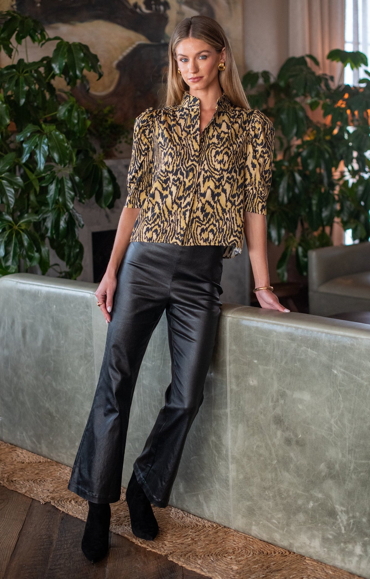 Women's gold and black animal print blouse with puff elbow sleeves and mandarin collar