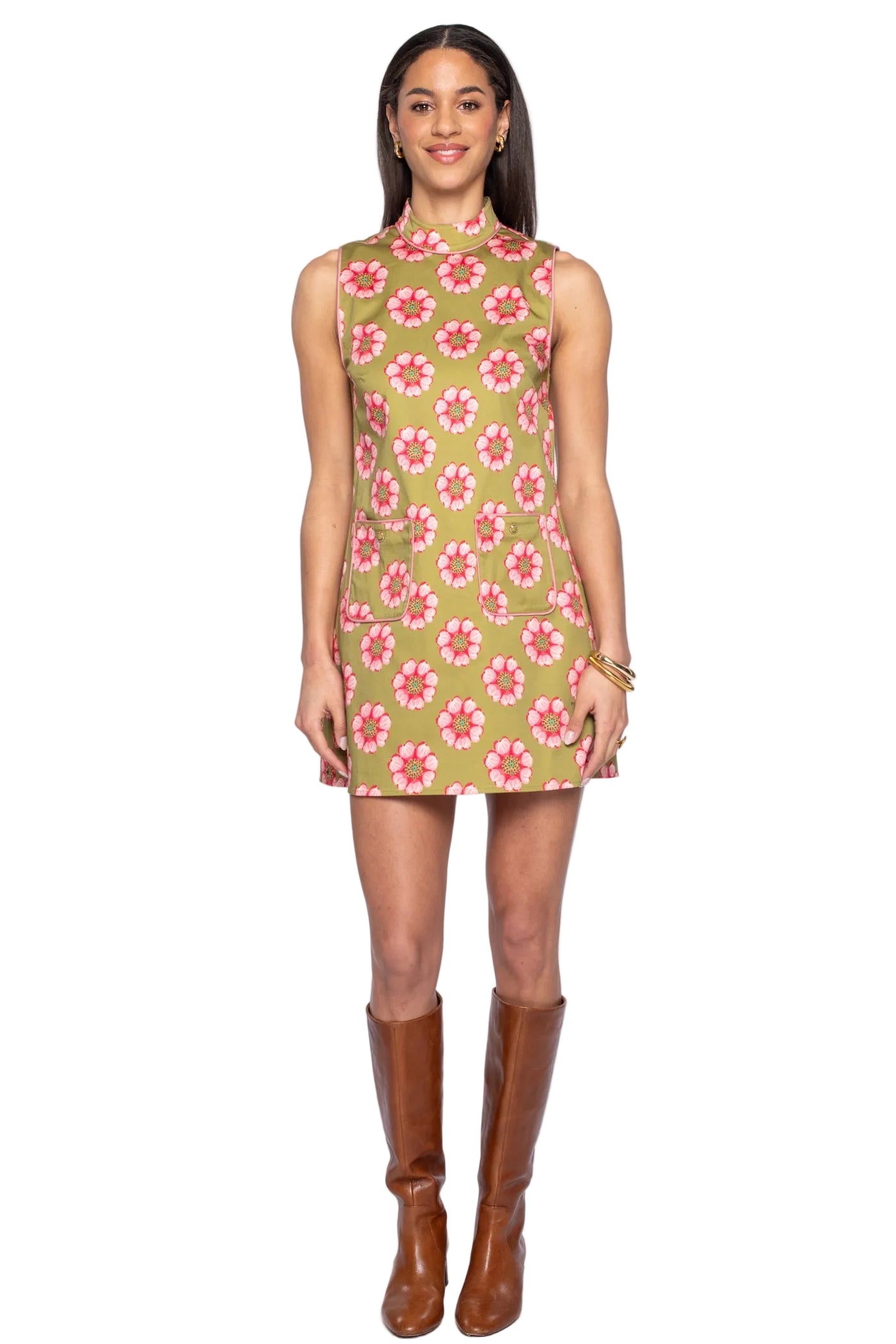 Olive green floral print sleeveless mini shift dress with mock neck and brown knee boots