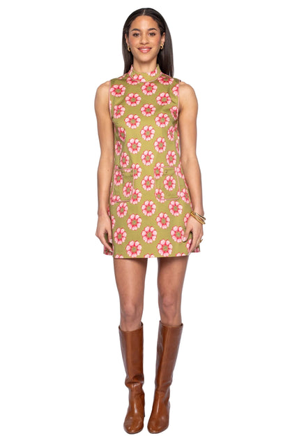 Olive green floral print sleeveless mini shift dress with mock neck and brown knee boots
