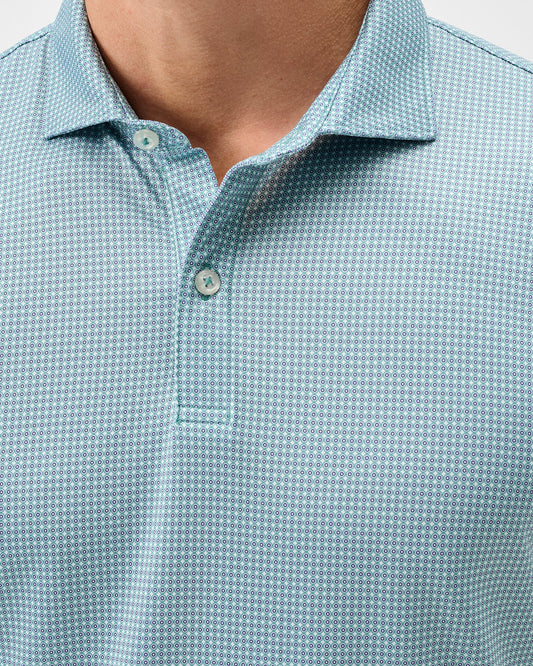 Men's mint green polo shirt with small circular dot print pattern and collar