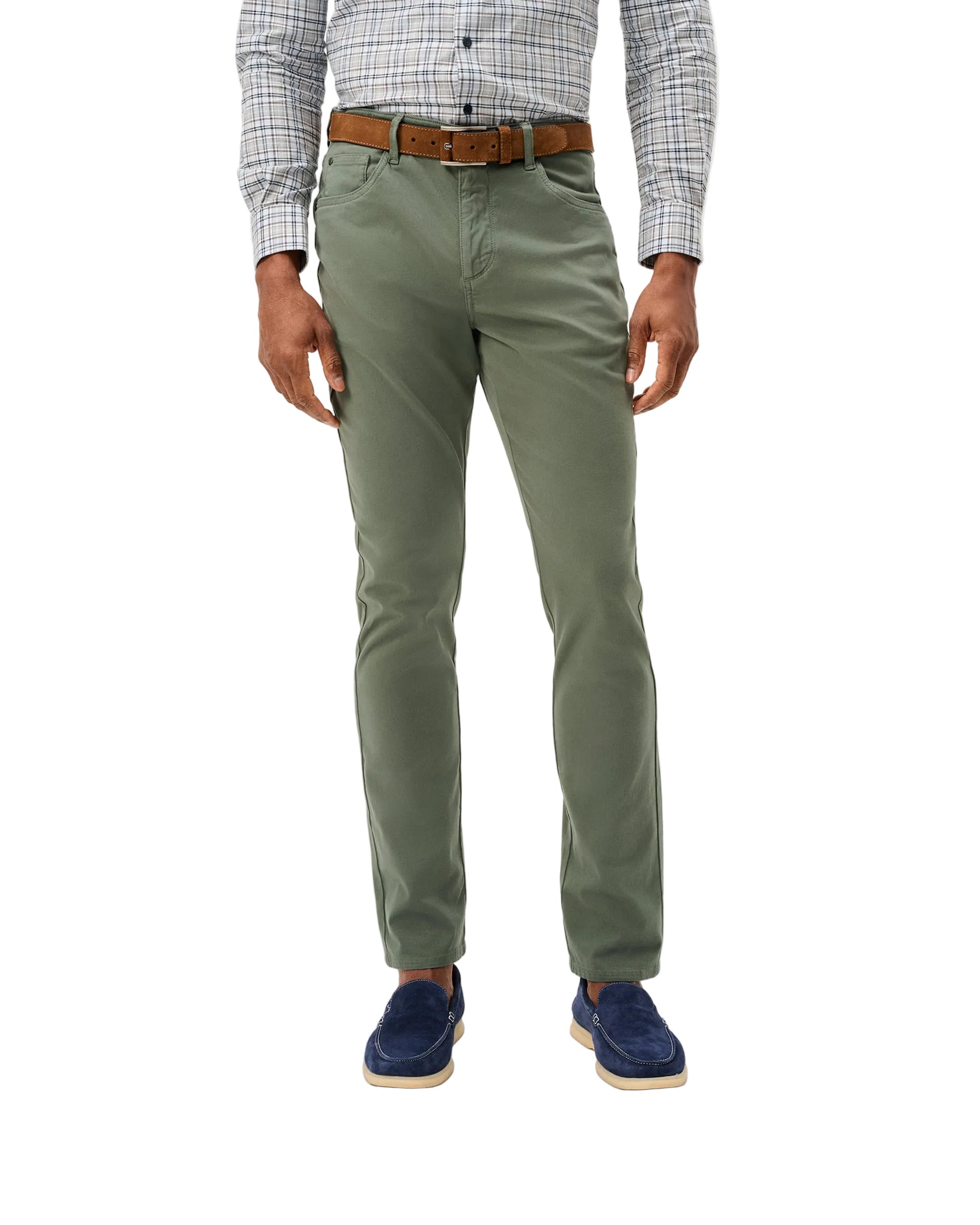 Olive green slim-fit sateen 5-pocket pants worn with plaid shirt and brown belt