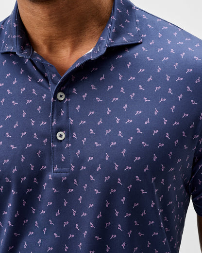 Navy blue men's polo shirt with small pink flamingo print and two buttons