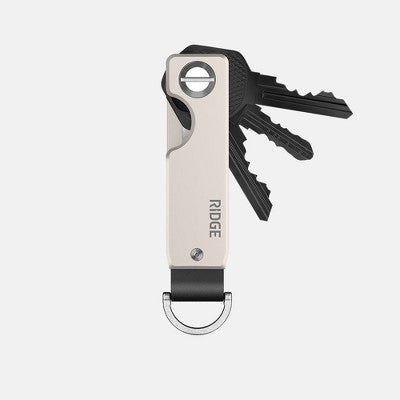 Ridge KeyCase compact key organizer in silver aluminum with black leather loop and three keys