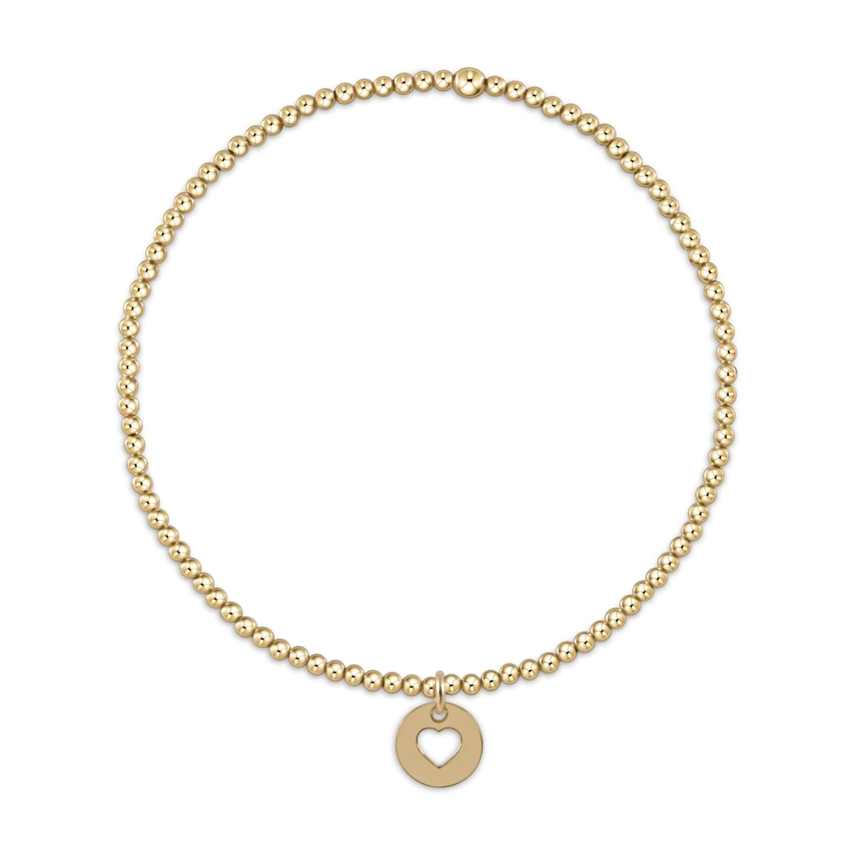 Gold beaded stretch bracelet with small round heart cutout charm pendant