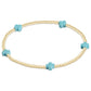 Gold beaded stretch bracelet with five turquoise cross accent beads evenly spaced