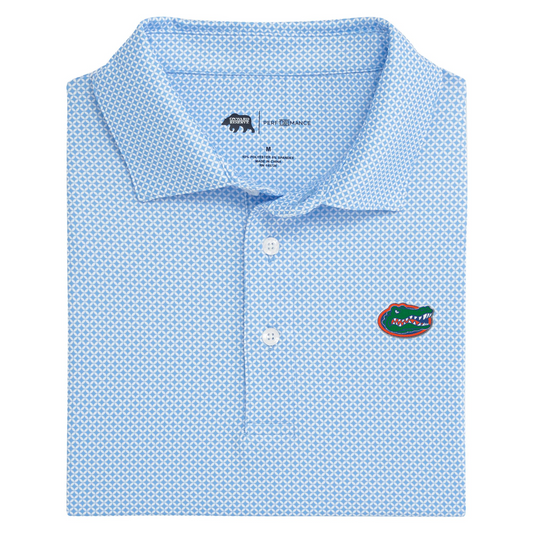 Light blue geometric print performance polo with University of Florida Gators logo on chest