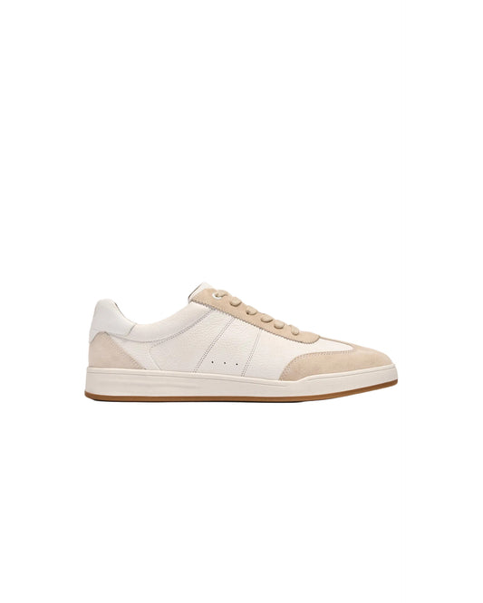 White and tan leather low-top sneaker with suede panels and gum sole