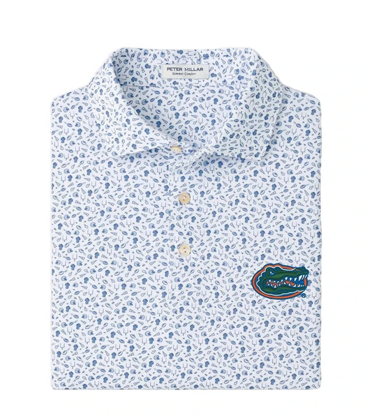 Peter Millar white polo with blue football print and Florida Gators logo patch