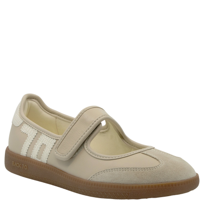 Beige Mary-Jane sneaker with velcro strap, suede toe cap, and gum rubber sole