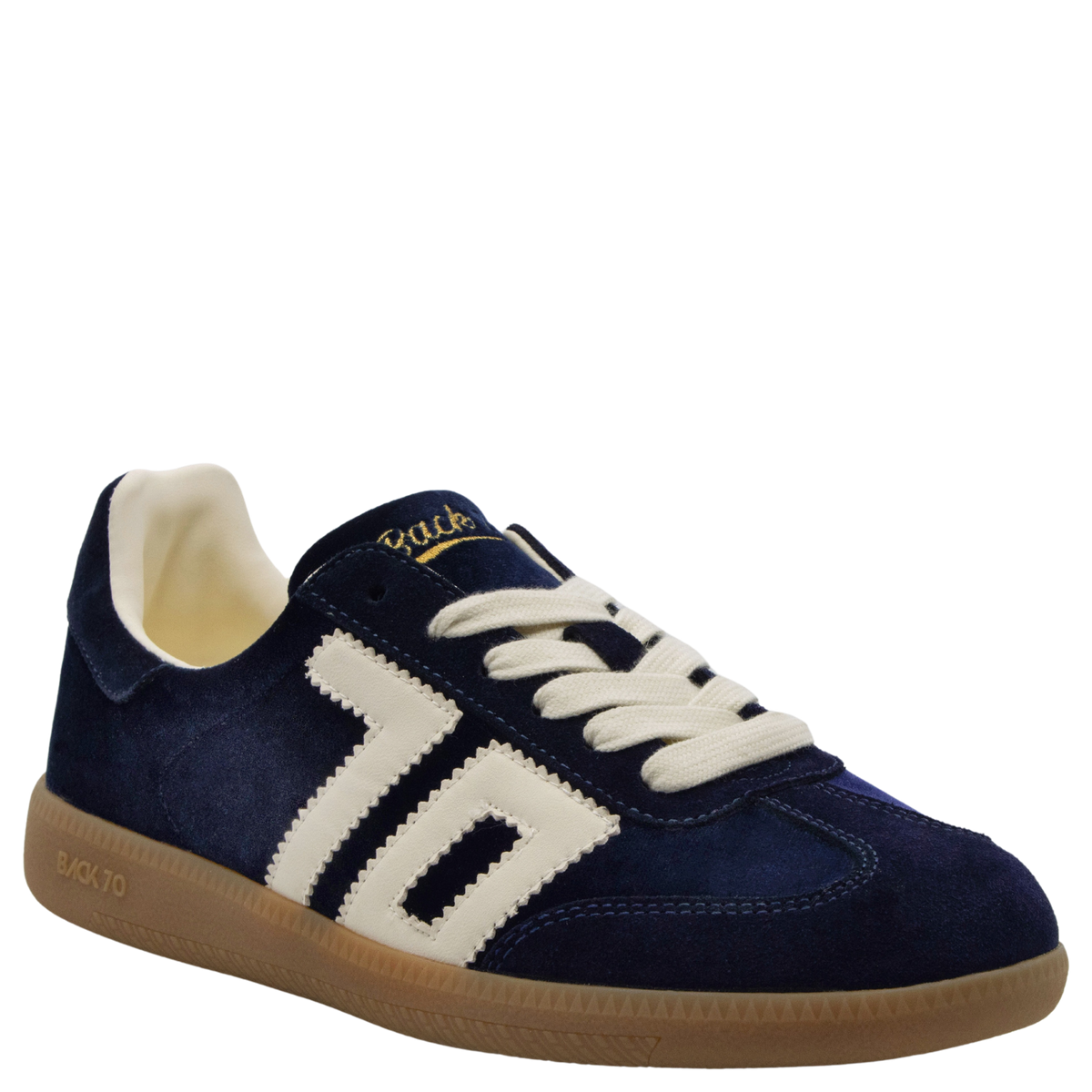Navy blue velvet low-top sneaker with cream side stripes and gum rubber sole