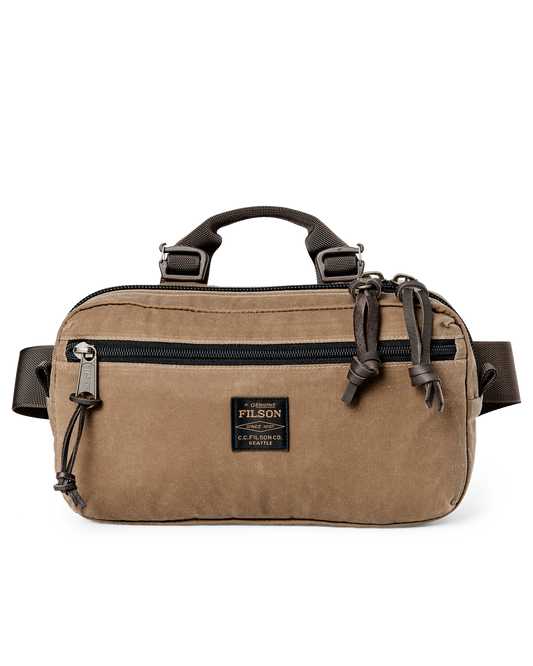 Filson Trapper Creek tan waxed canvas waistpack with black zippers and leather pulls