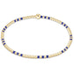 Gold and cobalt blue beaded stretch bracelet with single large gold accent bead