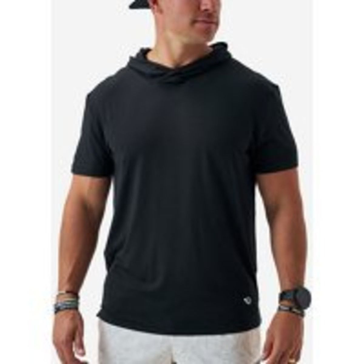 Men's black short sleeve performance hoodie with hood down, worn by male model