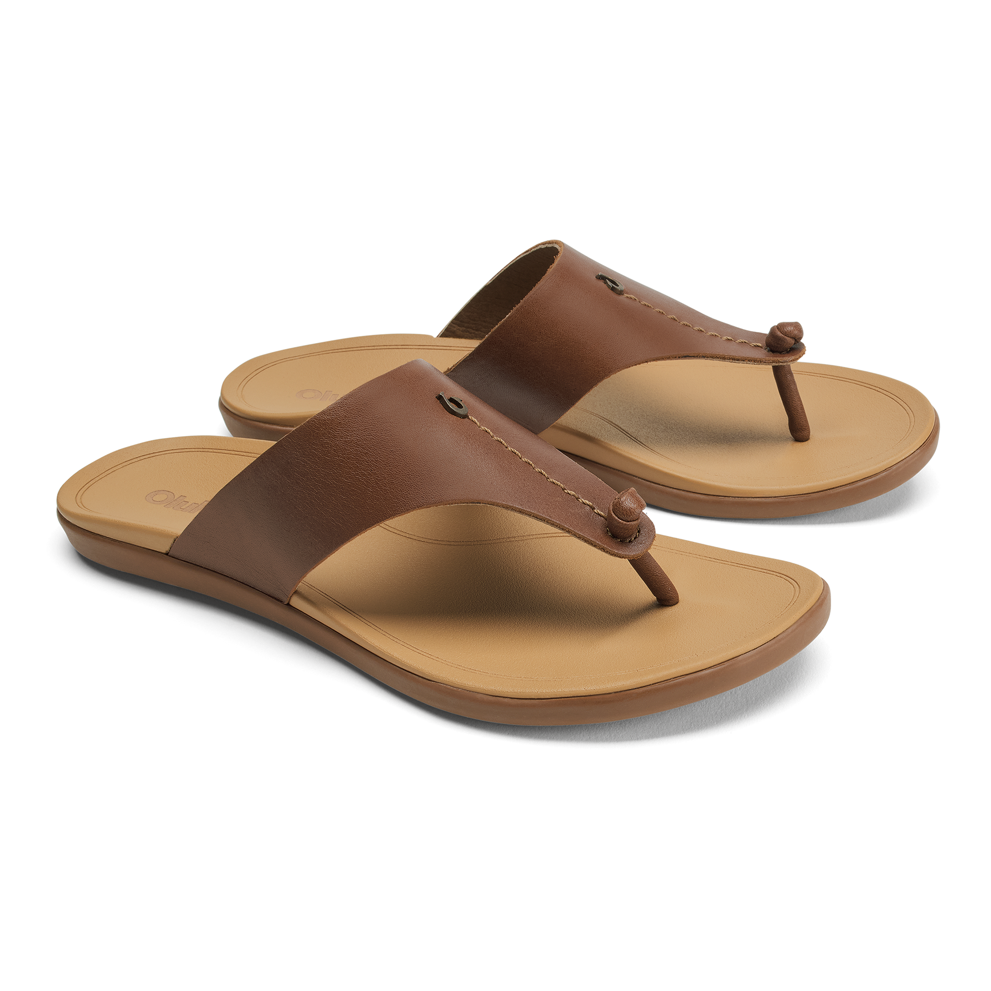 Women's brown leather thong sandals with tan cushioned footbed and rubber outsole