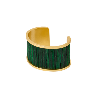 Wide gold-tone cuff bracelet with emerald green textured fiber inlay open back